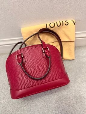 Louis Vuitton Epi Nano Alma Fuchsia